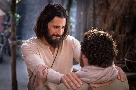 Jesus embraces Little James